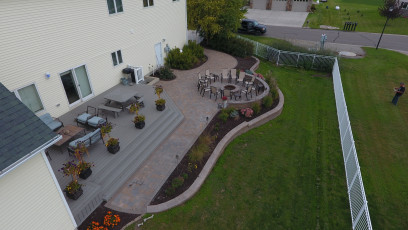 Aerial Vie of Gorgeous Paver Patio Landscape with Fire Pit