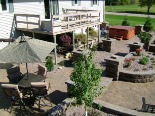 busy hardscape patio in fargo by oasis landscapes