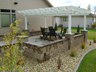 raised patio in fargo by oasis landscapes