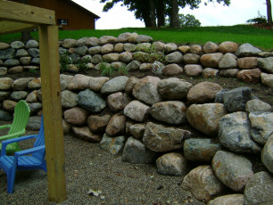 multi level rock retaining wall in West Fargo by oasis landscapes