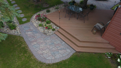 deck with hardscape patio in Fargo by oasis landscapes