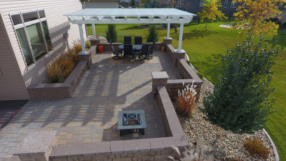 patio with pergola in fargo by oasis landscapes