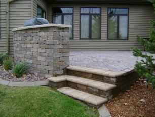 paver patio with stairs by oasis landscapes