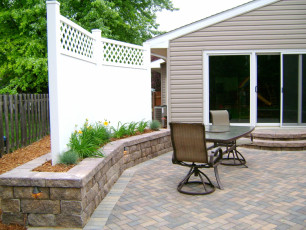 landscaping with white fence by oasis landscapes
