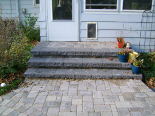 hardscape patio with stairs in fargo by oasis landscapes