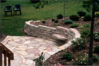 hardscape patio with retaining wall in Fargo by Oasis Landscapes