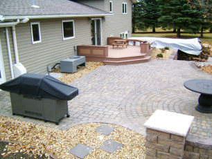 Patio with Grilling Station by Oasis Landscapes