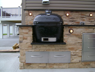Outdoor Kitchen with Egg Grill by Oasis Landscapes