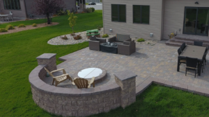 Patio with fire pit by oasis landscaping serving fargo moorhead and surrounding lakes area