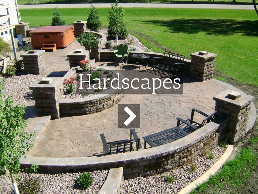 Landscaping in Fargo ND by Oasis Landscapes including Patios, Retaining Walls, Sitting Walls, Walkways, Stairs, and More!