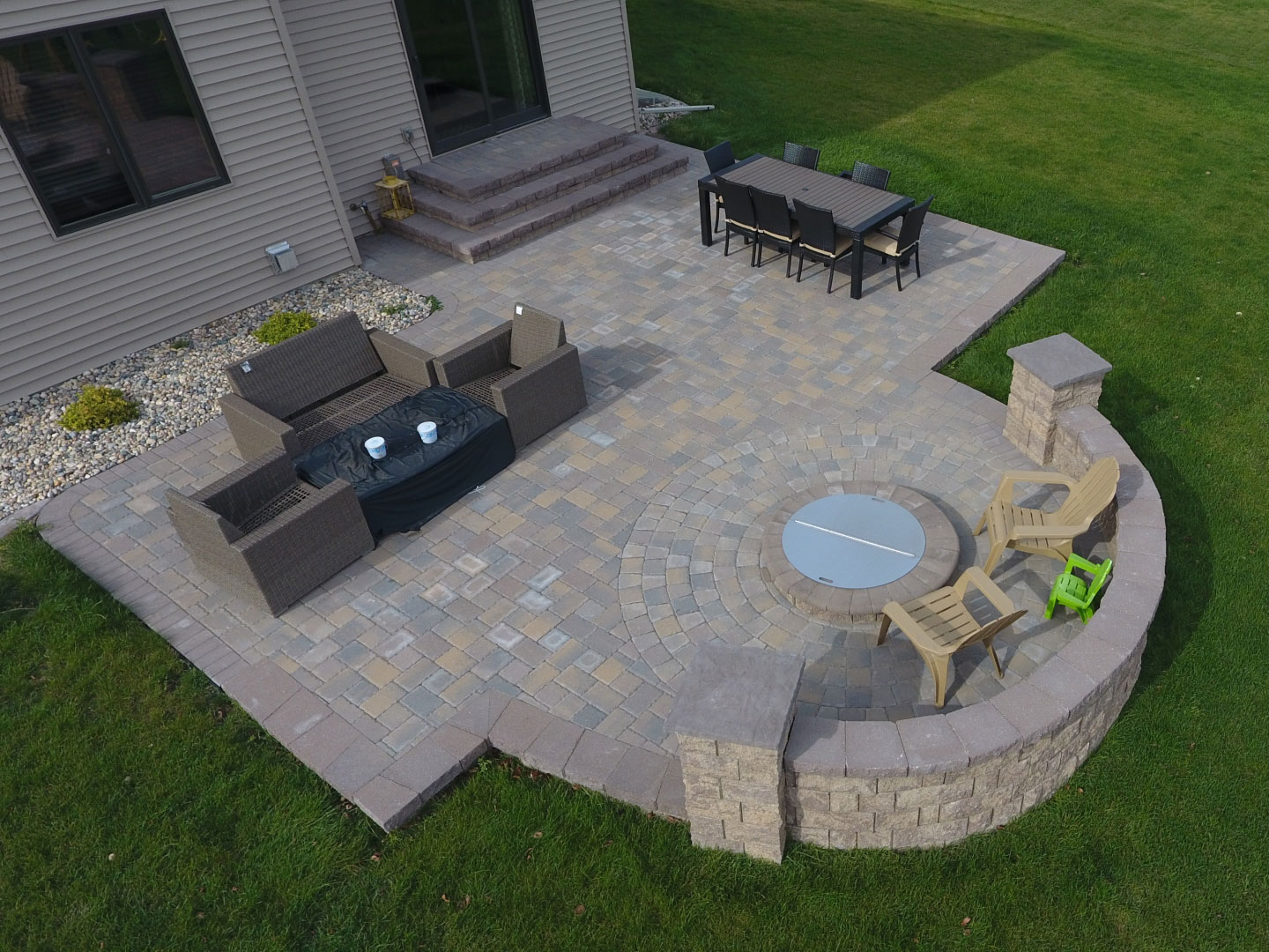 Backyard Fire Pit with Seat Wall and Paver Patio