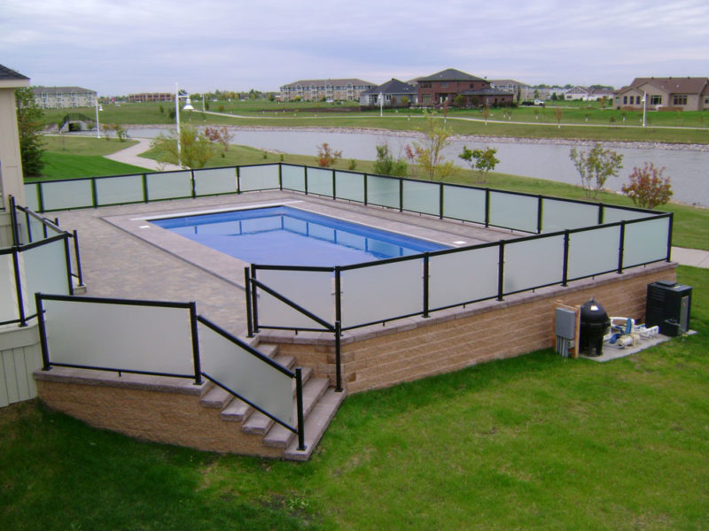 Raised Patio with Integrated Pool and Unique Privacy Panel Safety Rails ...