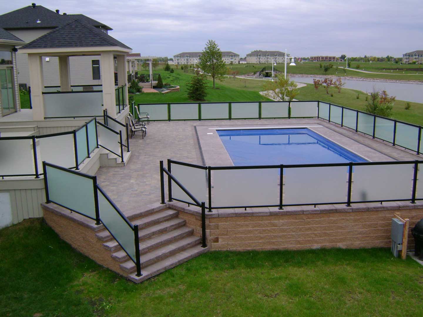 Raise Patio with Privacy Panels aroun Pool in Fargo, ND